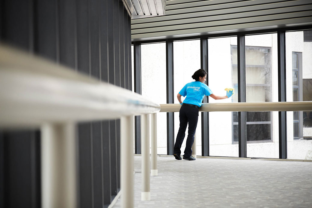 Woman wiping down the windows