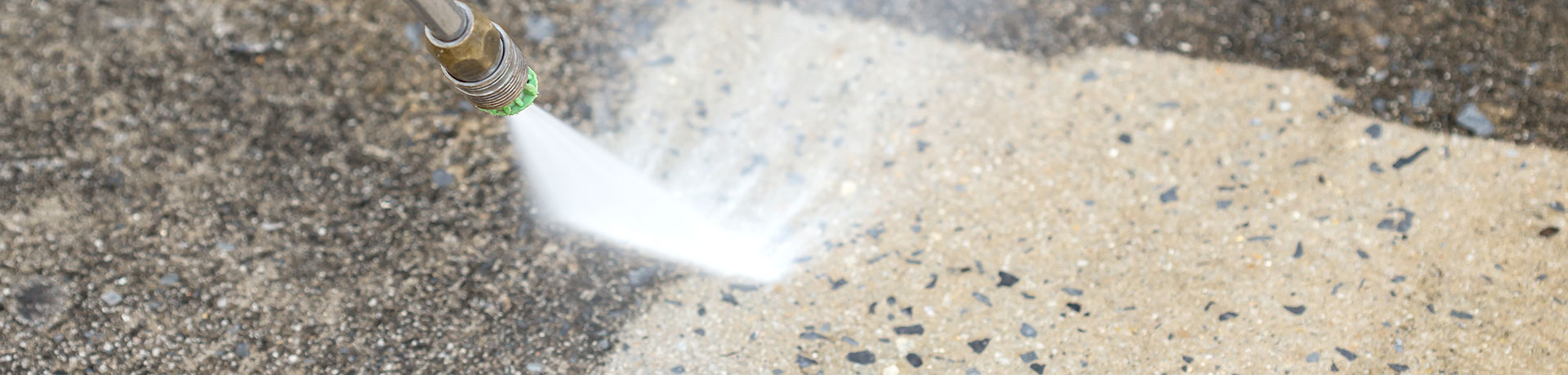 concrete being sprayed with water