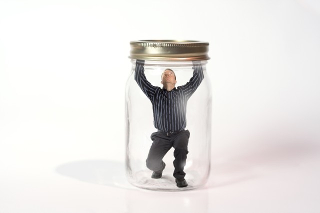 Man trapped in a jar.